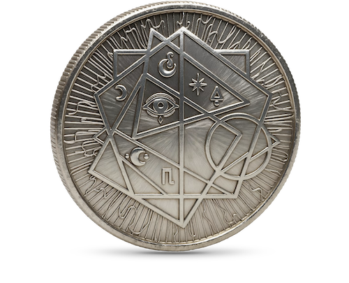 The Memento — solid metal decision coin in antique silver finish, front face with RADIX symbol